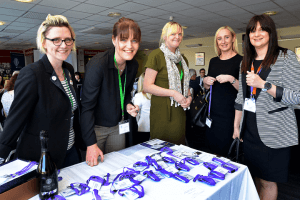 Jo Leigh from Launch north west with local business women welcoming guests to their first leigh networking meeting